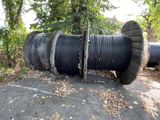 an image of a bunch of black wires laying on the ground