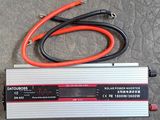 an image of a power invertor sitting on the ground