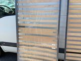 two wooden slats on the side of a van