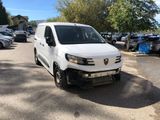 a picture of a white van parked in a parking lot
