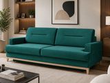 an image of a living room with a green couch and a coffee table