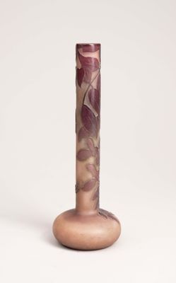 a vase that is sitting on a white surface
