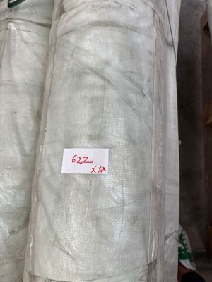a pile of bags of fabric sitting next to each other
