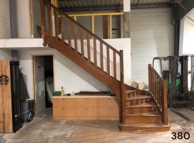a picture of a staircase in a building being remodeled