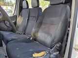 two seats in the back of a van that is dirty