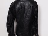 a black leather jacket on a mannequin mannequin mannequin mannequin mannequin mannequin mannequin mannequin manne