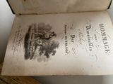 an old book with a picture of a man on it