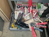 a lot of tools that are sitting in a bin