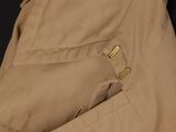 a close up of a jacket with a zipper on the back