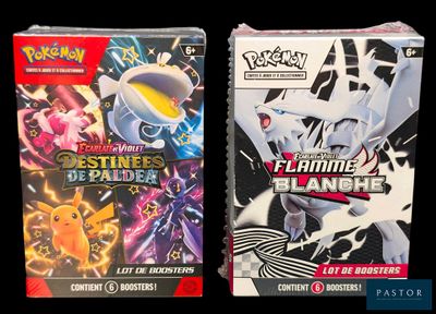 two boxes of pokemon card games sitting on top of each other