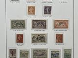 an image of a picture of a collection of stamps on a table