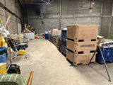 a room with a lot of boxes and crates in it