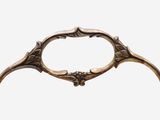 an image of a metal frame with flowers on it