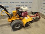 an image of a lawn mower being used by a company