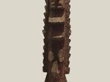 statue of a man holding a sword on a pedestal with a white background