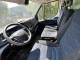a view of the inside of a vehicle from the driver ' s seat