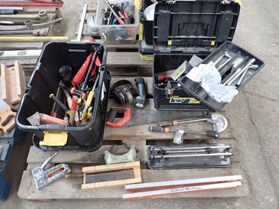 a lot of tools that are sitting on a pallet