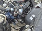 a car engine that is in the trunk of a car