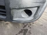 a car that has a hole in the front of it
