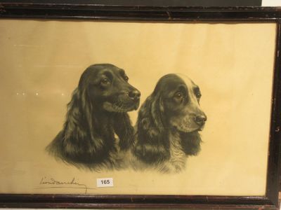 tableau représentant deux chiens, encadré et accroché au mur