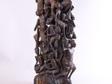 an image of a wooden sculpture of a group of people