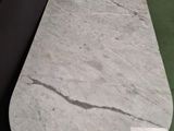 a close up of a marble table in a store