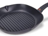 a black frying pan on a white background