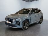 a grey volkswagen suv parked in a showroom