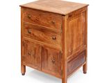 an image of a wooden chest of drawers on a white background