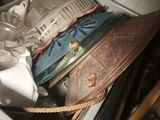 a box full of shoes and other items in it