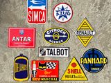 a lot of stickers on the wall of a building