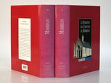 un livre rouge sur lequel figure l'image d'une église