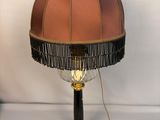 an image of a lamp that is on a table