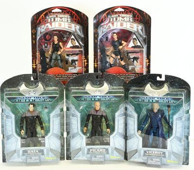 four star wars action figures are displayed on a white surface