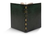 un livre noir à la couverture verte et aux bordures dorées
