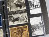 a black and white photo of a book with pictures of people and animals