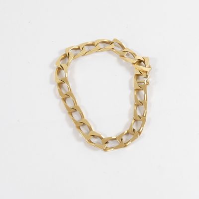 gold plated bracelet with a chain link on a white background