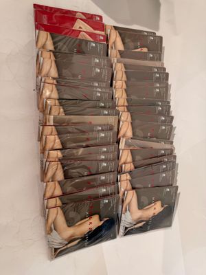 a lot of books on the wall of a store