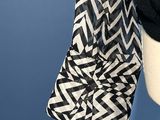 a black and white scarf hanging from a mannequin mannequin mannequin mannequin mannequin mannequin mannequin mannequin