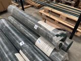 many rolls of galvaniized steel wire in a warehouse