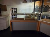 a display case with a glass case in the middle of it