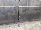 a crack in the side of a car door