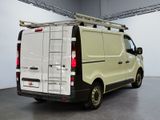 a white van with a ladder on the back of it