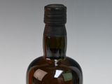 a bottle of liquor that is sitting on a table