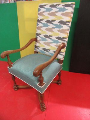a chair that is sitting on a red floor