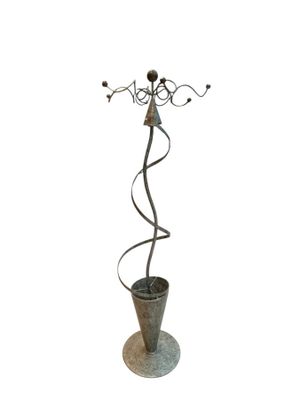 wrought iron candle holder with spiral design and metal base