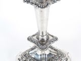an image of a silver candle holder on a white background