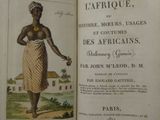an old book with a picture of a woman holding a flower