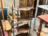 a shelf that has a lot of items on it