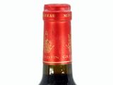 a bottle of wine that is sitting on a table